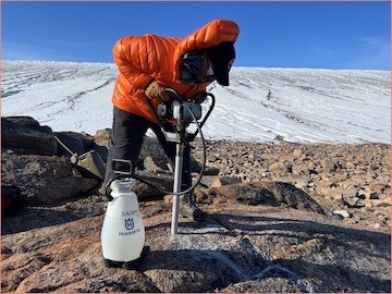 Collecting a bedrock sample for cosmogenic nuclide dating in NW Greenland. 